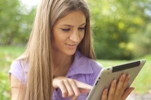 woman using tablet